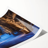 Rolled print showcasing an intricate landscape design featuring caves and natural formations, elegantly packaged in a protective cardboard tube, ideal for art enthusiasts.