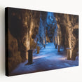 Stretched canvas artwork showcasing a serene landscape scene with caves and mountains, featuring rich colors and intricate details, perfect for home decor.