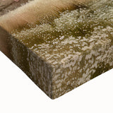 Large art of a black and white landscape painting on stretched canvas depicting rustic cottages.