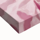 Close-up of a large black and white canvas featuring an array of pastries, ideal for bedroom wall decor.