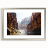 Framed landscape print of a canyon scene under a clear blue sky, featuring a silver mat and frame that enhances the artwork's vibrant colors and details.