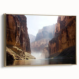 Framed canvas artwork depicting a striking landscape of canyons with rich gold accents, showcasing vibrant colors and intricate details, perfect for home decor.