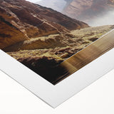 Vibrant landscape canvas print showcasing majestic canyons under a bright blue sky, featuring rich earth tones and textured detail, perfect for home decor.