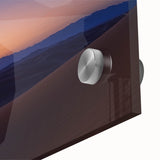 Close-up of vibrant desert landscape artwork on acrylic glass, showcasing rich earthy tones and intricate details, perfect for modern home decor.