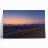 Desert landscape stretched canvas artwork showcasing vibrant hues of orange and yellow, depicting a serene sunset over rolling dunes, perfect for modern home decor.
