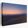 Desert landscape stretched canvas artwork showcasing vibrant hues of orange and gold, depicting a serene sunset over sand dunes, perfect for home decor.