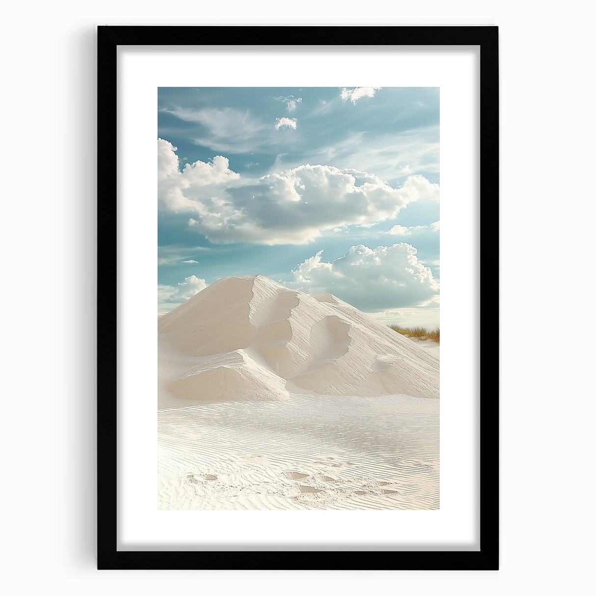 Framed landscape art print showcasing serene sand dunes in soft beige and golden hues, featuring a sleek black frame with a white mat for an elegant presentation.