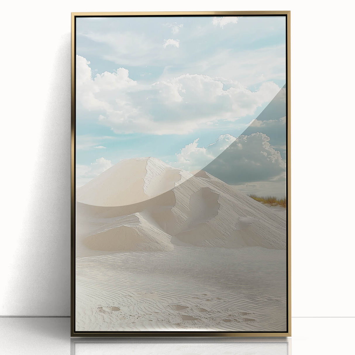 Framed acrylic artwork showcasing a serene landscape of rolling sand dunes, highlighted by a gold border, perfect for modern home decor and interior design.