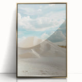 Framed acrylic artwork showcasing a serene landscape of rolling sand dunes, highlighted by a gold border, perfect for modern home decor and interior design.