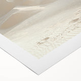Rolled canvas showcasing a stunning landscape of golden dunes under a vibrant blue sky, designed for wall art enthusiasts, carefully packaged in a protective tube.