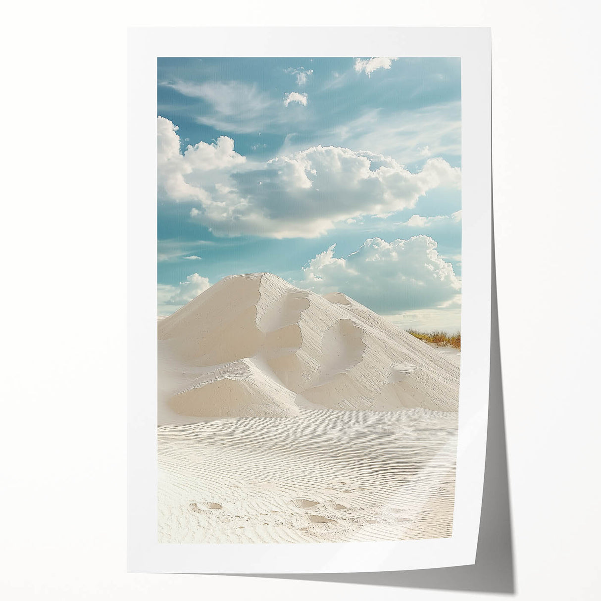 Rolled landscape print depicting serene sand dunes under a vibrant sunset, showcasing warm hues of orange and gold, ideal for home decor or art enthusiasts.