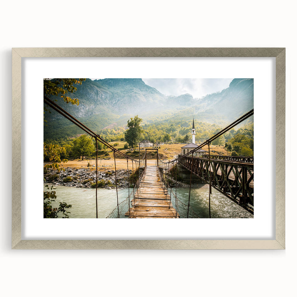 Extra large abstract art print depicting a textured European scenery in muted earth tones, framed in silver.