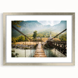 Extra large abstract art print depicting a textured European scenery in muted earth tones, framed in silver.