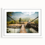 Textured abstract art print of a European scenery in muted earth tones, framed with a white mat.