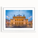 Textured abstract art print of a European scenery in muted earth tones on a framed white mat, suitable for bedroom decor.