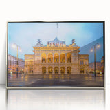 Large art print of a European Austrian landscape in muted green and blue tones, acrylic framed in silver.