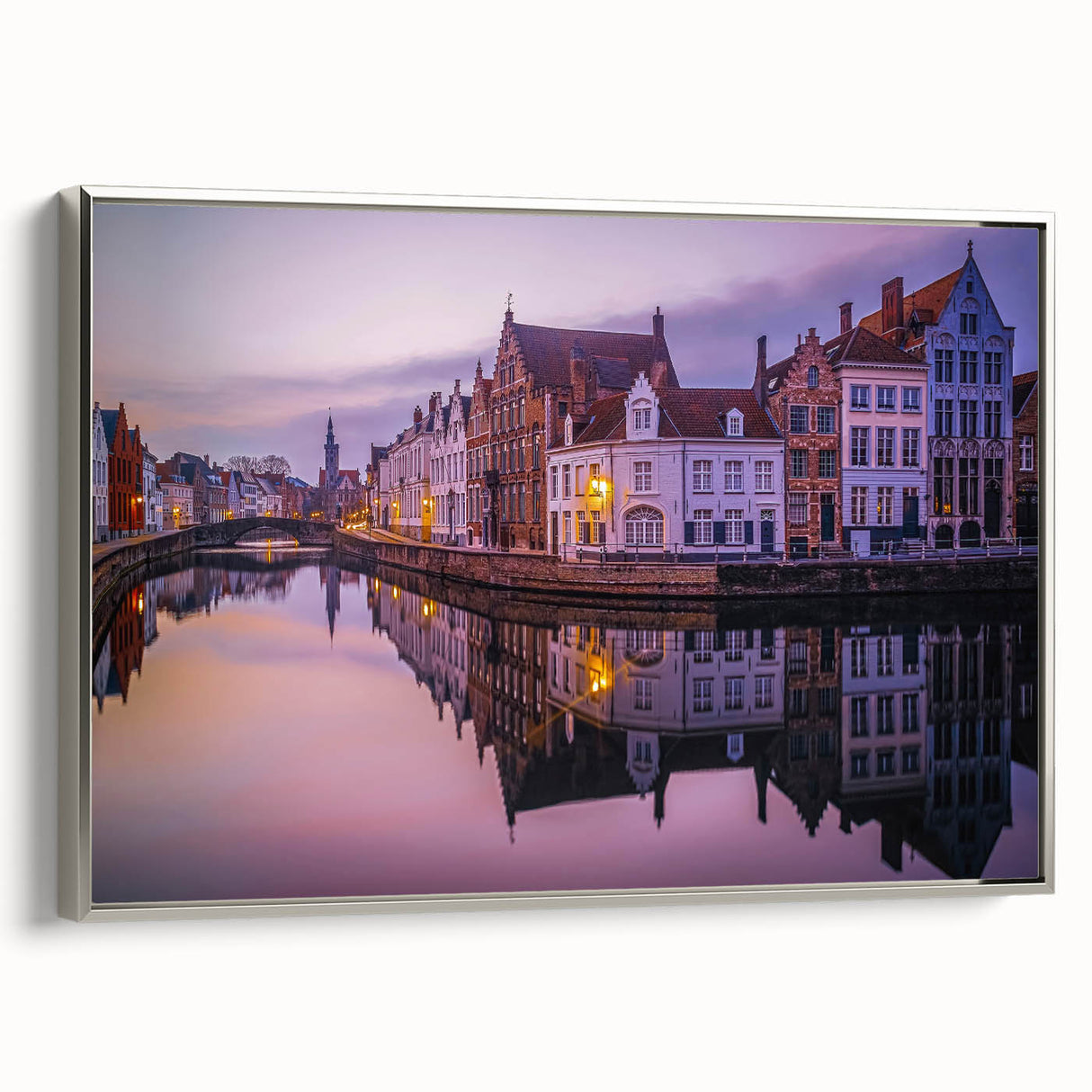 Framed canvas featuring a vintage-style landscape art painting of a European scenery in muted colors.