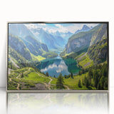 Large art print of a Bavarian landscape, featuring muted green and blue tones on a silver-framed acrylic.