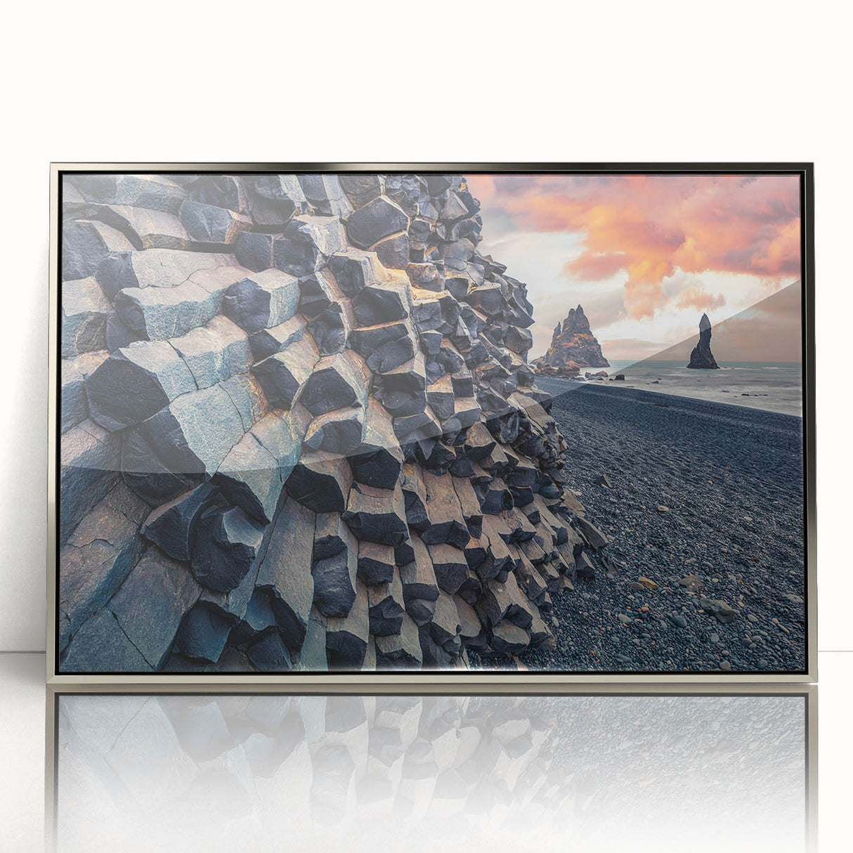 Large acrylic print of a serene Icelandic landscape in muted blue and gray tones, framed in silver.