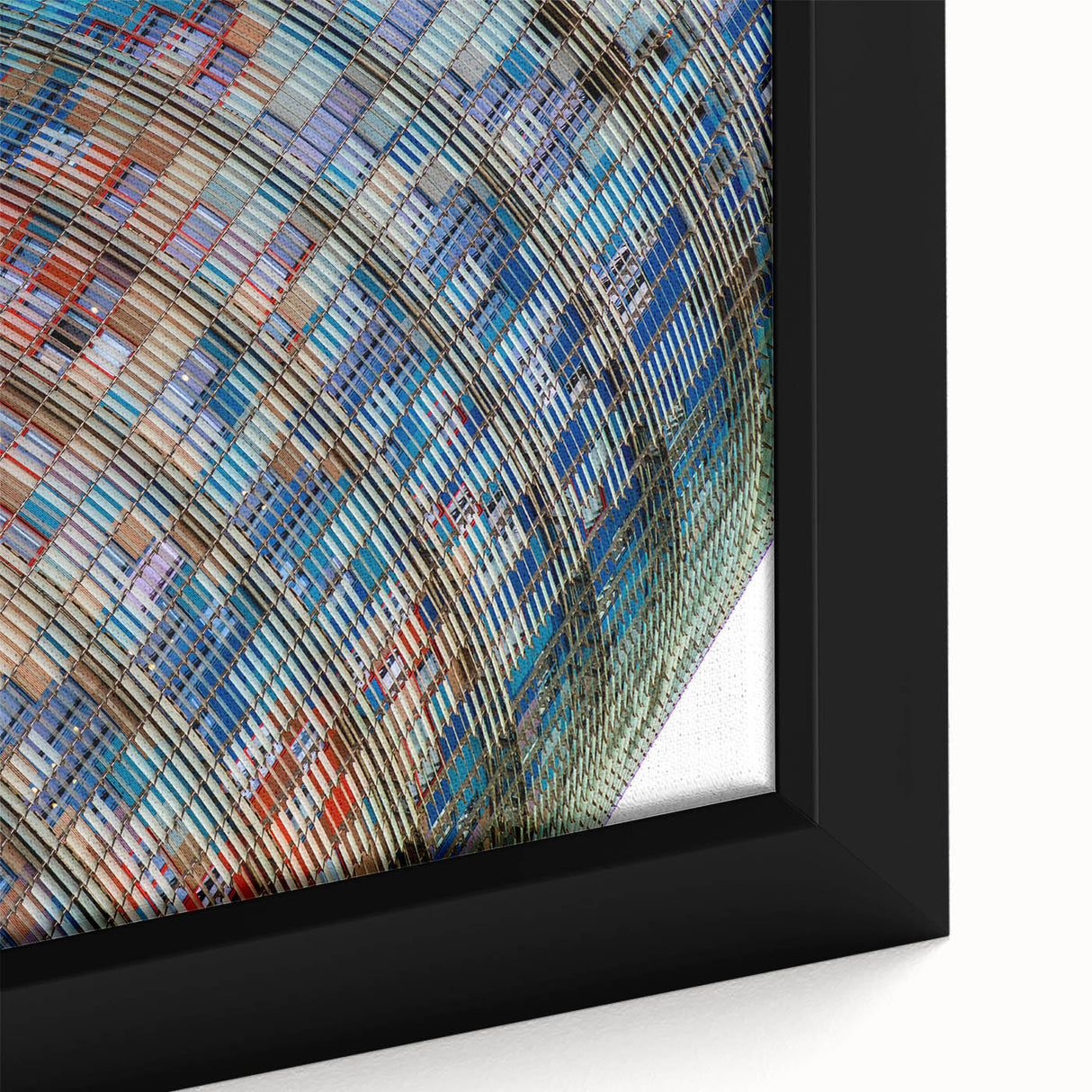 Close-up of a framed canvas featuring a textured depiction of Barcelona with a black and colorful art palette.
