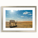 Textured abstract art print of Middle Eastern Oman scenery in muted earth tones, framed in silver.