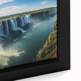 Framed canvas featuring a textured depiction of a vibrant South American scenery in black with colorful accents.