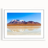 Abstract art print of a Bolivian landscape in muted earth tones on a framed white mat.