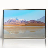 Mid-century modernist art depicting a scenic view of Bolivia in muted earth tones on a silver-framed acrylic print.