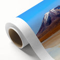 Art deco poster of a Bolivian landscape on rolled canvas, featuring earth tones.