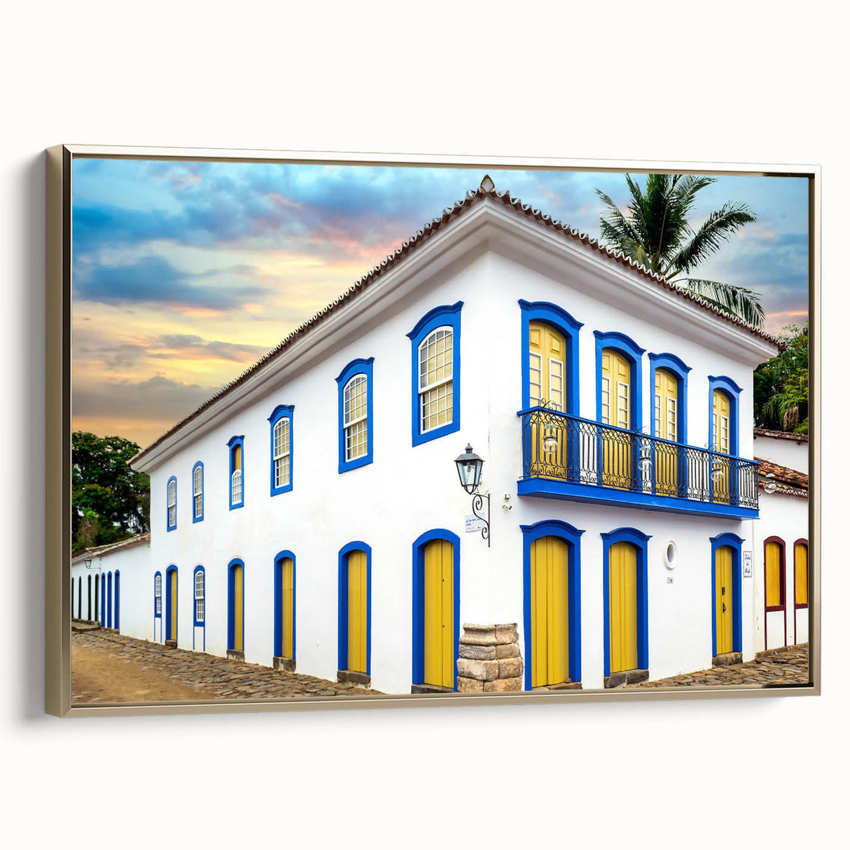 Framed canvas featuring a vintage-style landscape painting of a Brazilian scene in black and gold tones.
