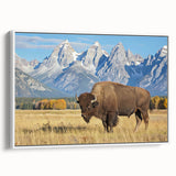 Vintage poster art of Grand Tetons in muted colors on a large framed canvas, ideal for living room decor.