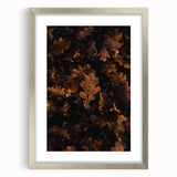 Textured abstract art print depicting autumnal hues on a silver-framed canvas, suitable for bedroom decor.