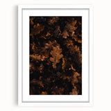 Abstract art print of autumnal trees in orange and red tones on a white framed canvas, suitable for dining room decor.
