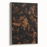 Framed canvas featuring a vintage landscape art painting of fall trees, with vibrant red and orange leaves.