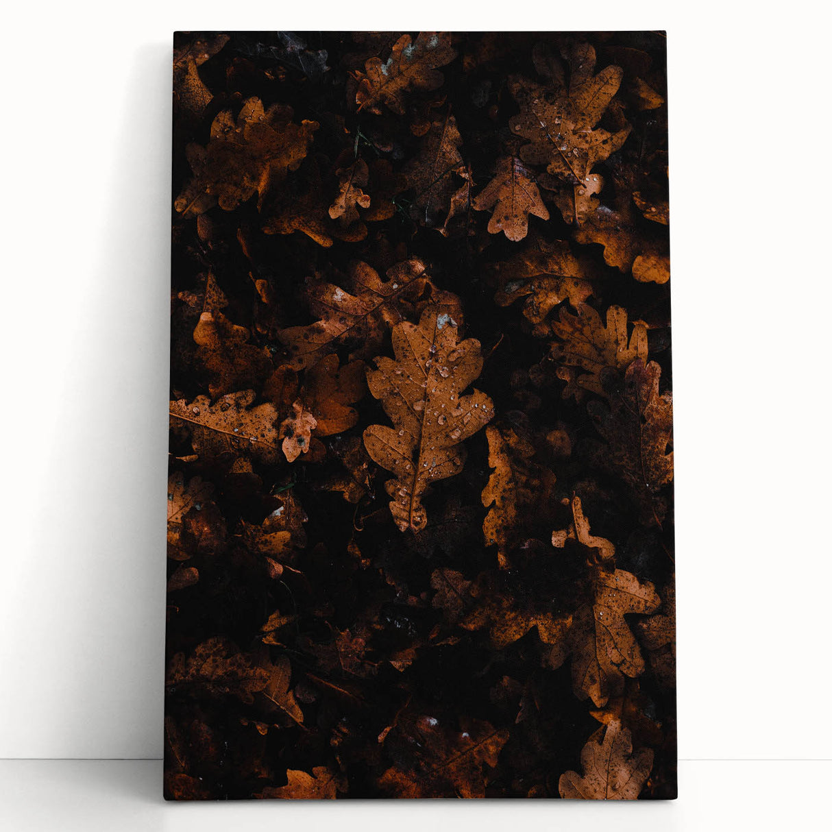 Black and white abstract design on stretched canvas, featuring swirling patterns.