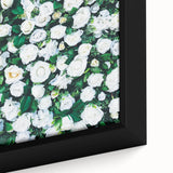 Close-up of extra large framed canvas featuring black textured art with colorful, abstract spring motifs.