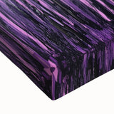 Close-up of a vibrant abstract floral stretched canvas print, showcasing intricate brush strokes in rich colors like blue, pink, and gold, perfect for modern home decor.