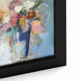 Close-up of a framed abstract floral canvas artwork, showcasing vibrant colors and intricate details, perfect for modern home decor. This piece adds a touch of elegance and creativity to any living space.