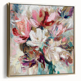 Framed canvas artwork showcasing an abstract floral design in silver and gold tones, elegantly set against a neutral background, perfect for modern home decor.