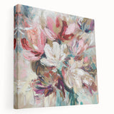 Abstract floral stretched canvas artwork in vibrant hues of pink, blue, and gold, showcasing a modern design that enhances home decor with elegance.