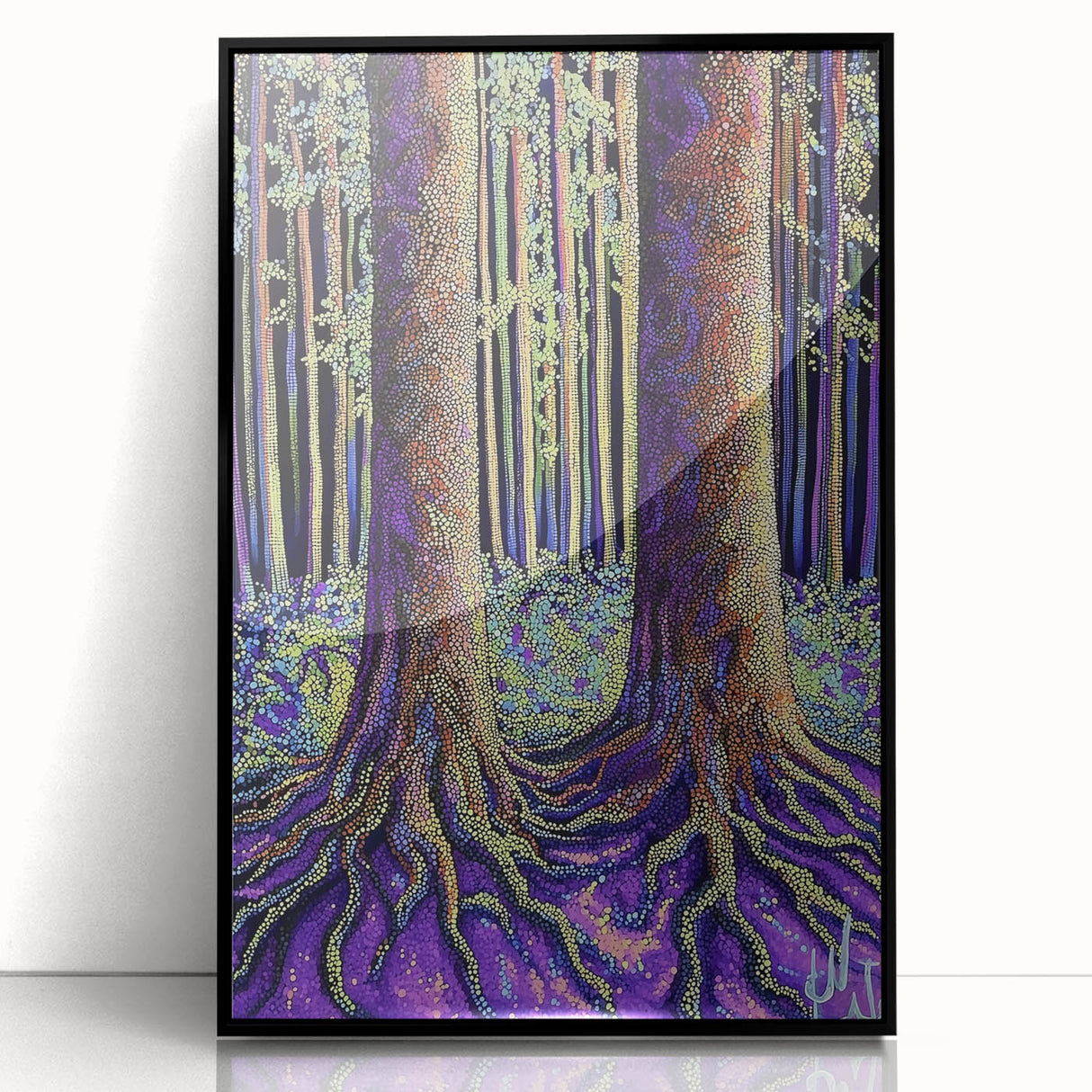 Framed acrylic artwork showcasing an abstract floral design with vibrant colors against a sleek black background, perfect for modern home decor.