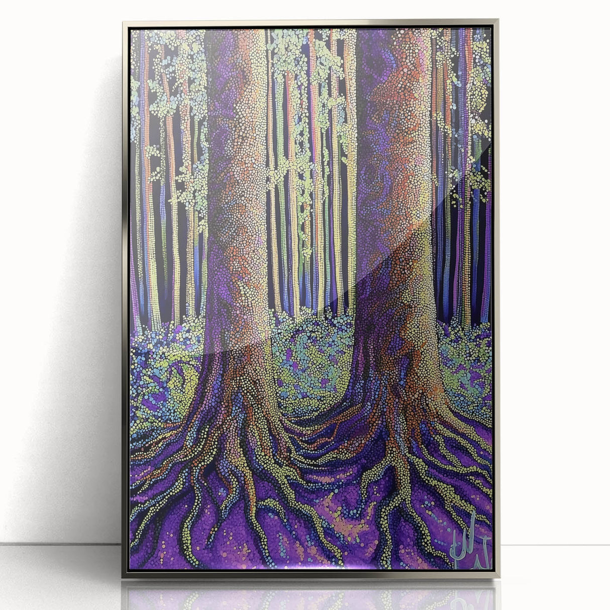 Framed acrylic artwork featuring an abstract floral design with vibrant colors and a silver frame, ideal for modern home decor or office spaces.