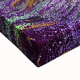 Close-up of an abstract floral stretched canvas artwork showcasing vibrant colors and intricate details, perfect for modern home decor or art enthusiasts.