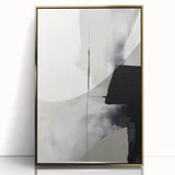 Abstract minimalist wall art featuring a gold-accented design in a sleek black frame, ideal for modern decor, displayed against a neutral background.