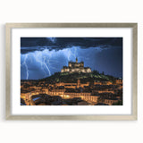 Framed landscape artwork depicting a serene castle scene, elegantly presented with a silver mat, highlighting intricate details and vibrant colors for an exquisite home decor accent.