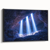 Framed canvas artwork depicting a dramatic landscape with caves, featuring a black frame and side view, ideal for modern home decor and art enthusiasts.