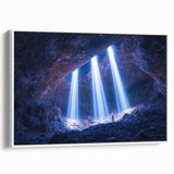 Framed canvas art showcasing a serene landscape with intricate cave formations, presented in a sleek white frame, perfect for home decor or art enthusiasts.