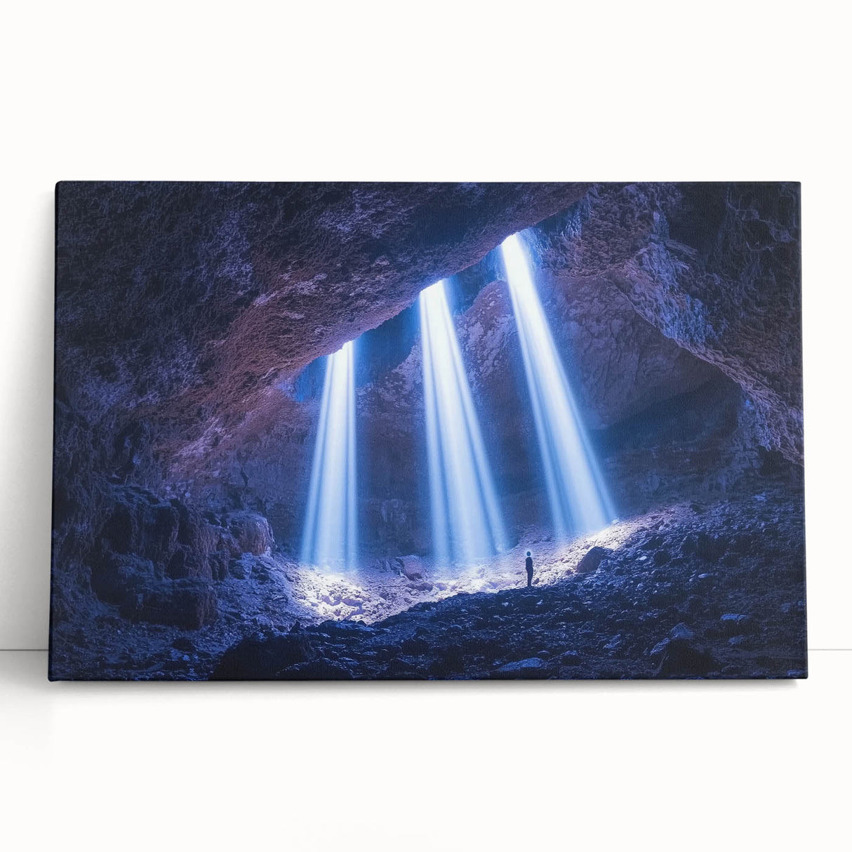 Vibrant stretched canvas artwork depicting a serene landscape with intricate cave formations, showcasing rich earth tones and dramatic textures, perfect for home decor.