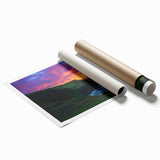 Stunning landscape print showcasing dramatic cliffs and serene ocean waves, rolled and packaged in a protective cardboard tube, ideal for home decor.