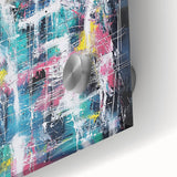 Close-up of a vibrant abstract acrylic glass artwork featuring colorful splatters and fluid patterns, perfect for modern home decor or art enthusiasts.